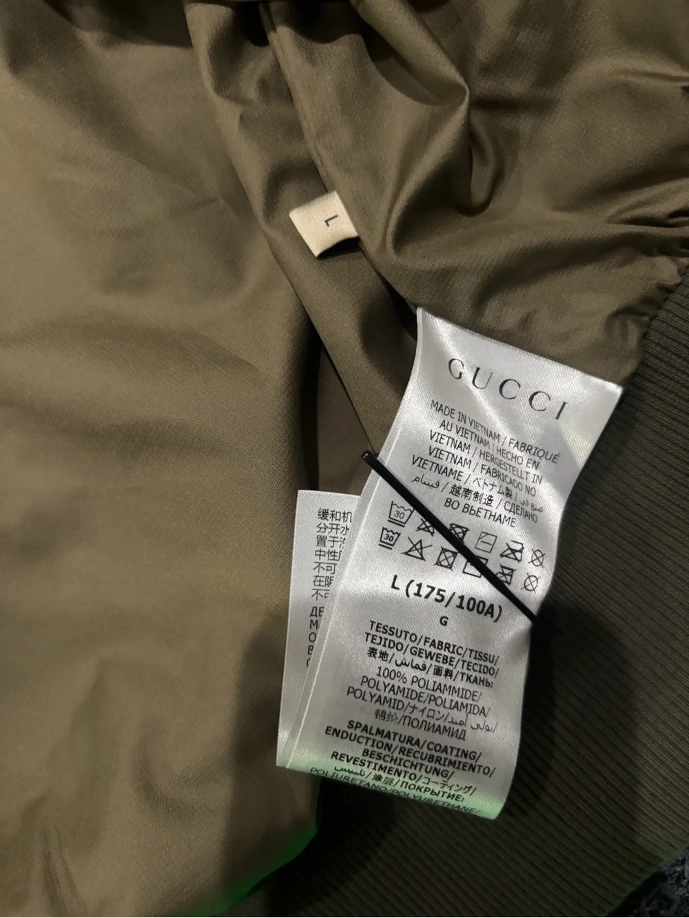 The North Face Olive Green Bomber Jacket with Logo Patch with garment bag & box